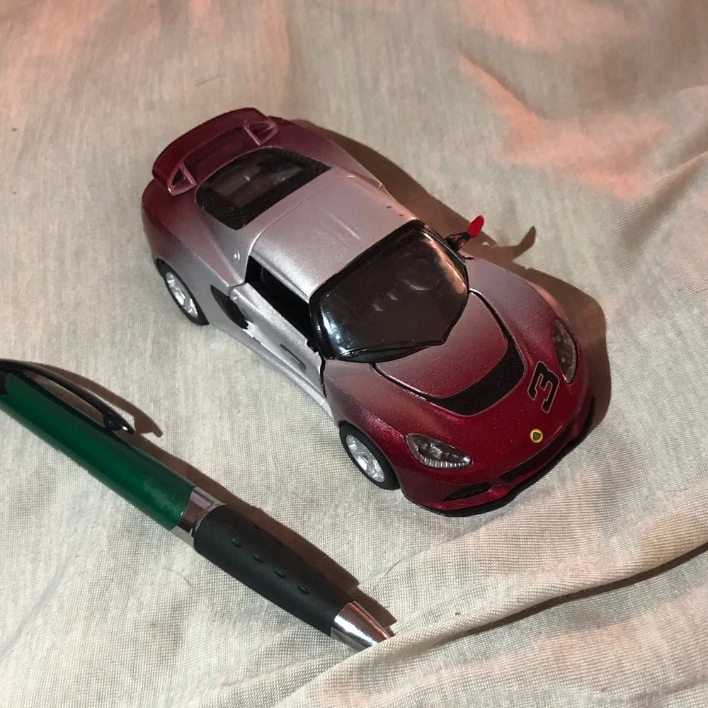 Red and Silver Lotus Exige S pull back action.